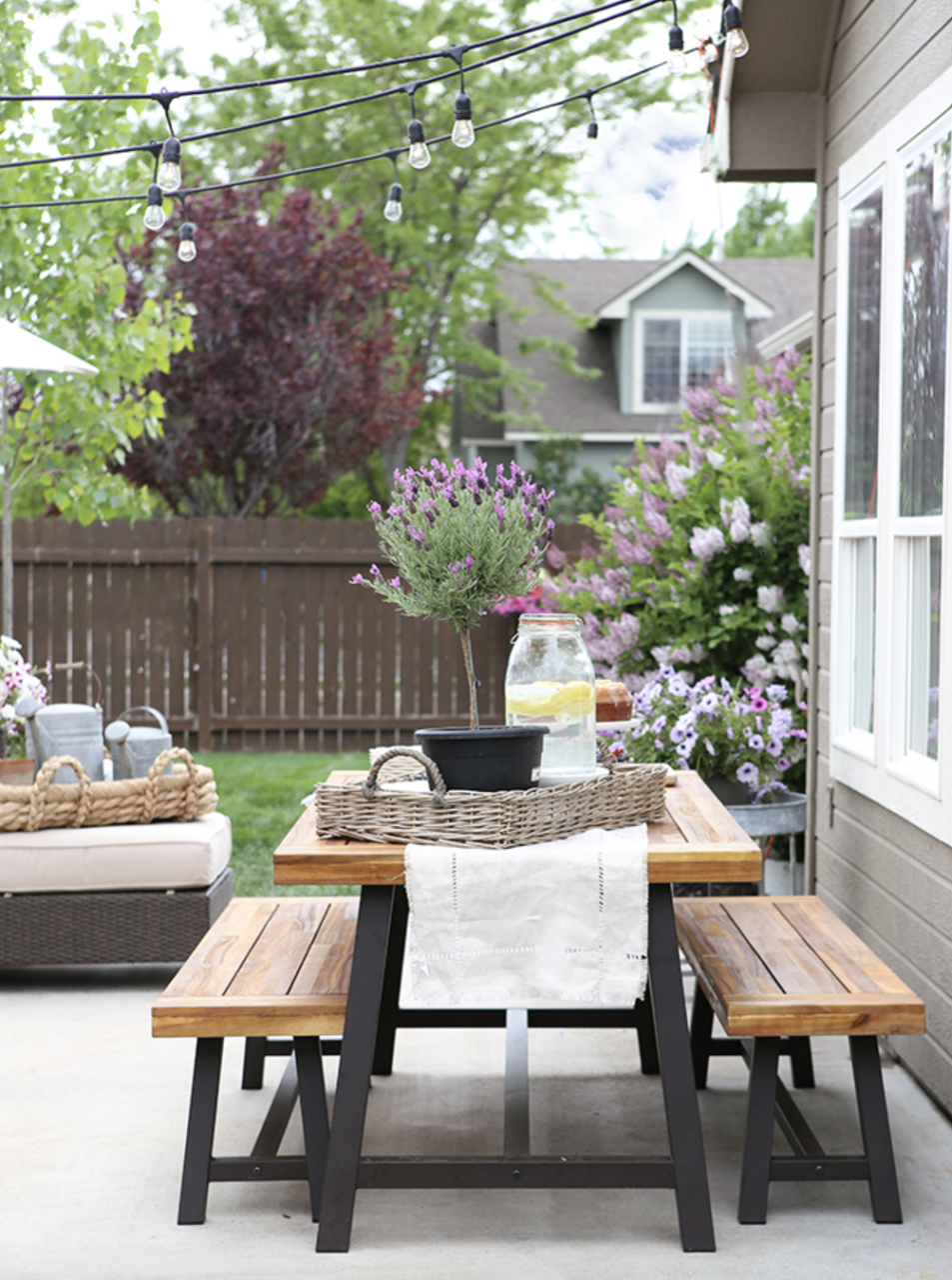 backyard string lights outdoor dining table